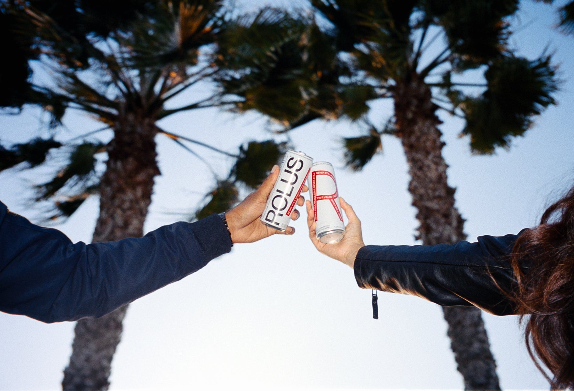 Two people enjoying a ROLUS, packed with electrolyte hydration.